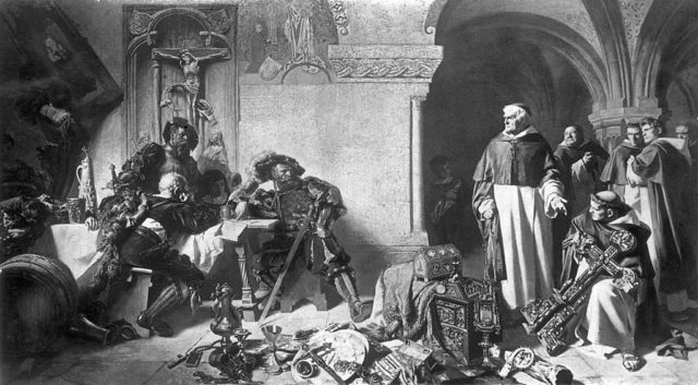 Men seize goods from a monastery during the Reformation