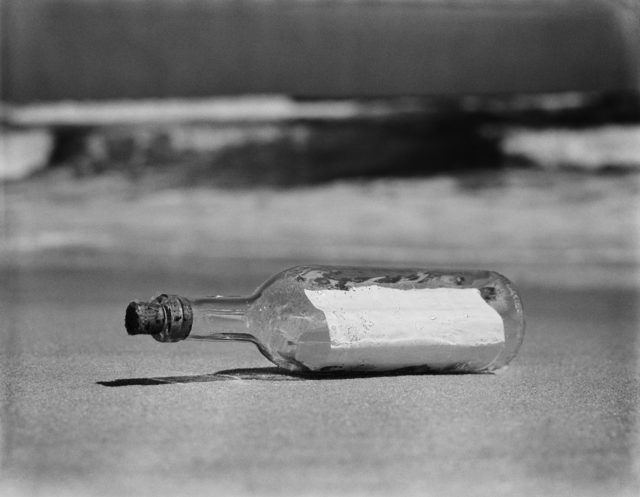 Message in a bottle on a beach