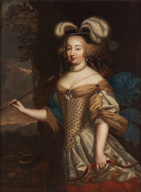 Françoise-Athénaïs De Rochechouart wearing an elegant dress and hat, holding a paint brush while she paints.