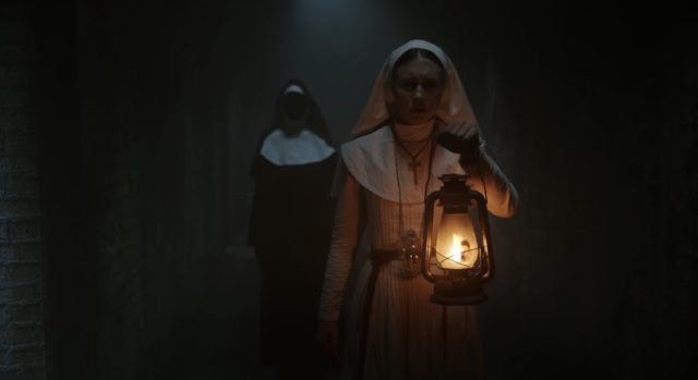 Still of a nun and ghost from the movie The Nun
