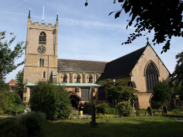 Outdoor shot of church with trees in the foreground