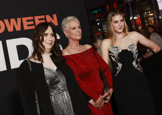 Jamie Lee Curtis with her daughters on either side