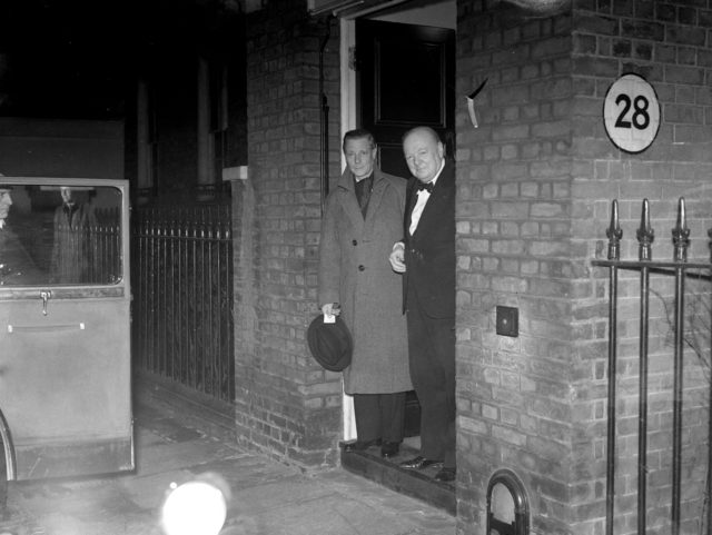 Edward, Duke of Windsor, and Winston Churchill standing in a doorway