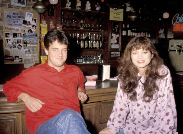 Matthew Perry and Valerie Bertinelli sitting at a bar