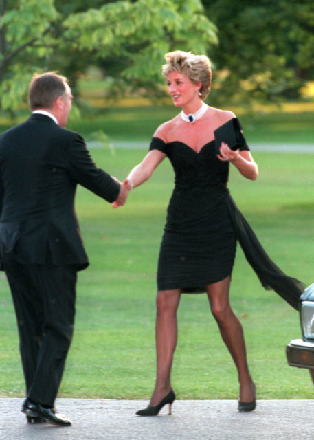 Diana shaking hands with a man wearing the infamous "revenge dress"