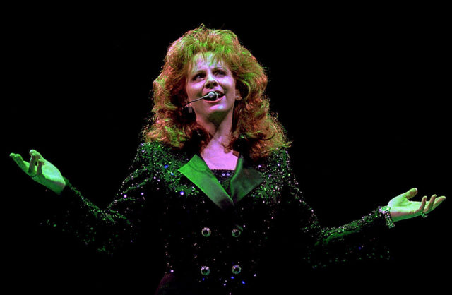 Reba McEntire on stage in 1997