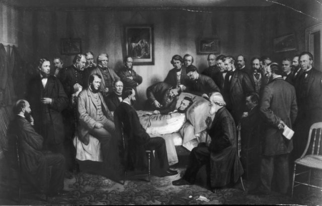 Crowd gathered around Abraham Lincoln on his deathbed
