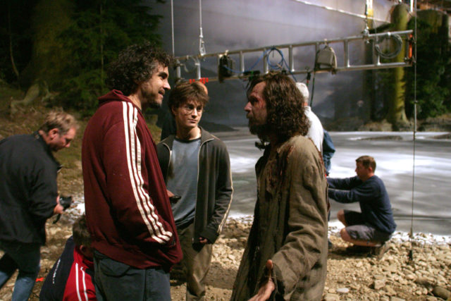 Alfonso Cuarón, Daniel Radcliffe and Gary Oldman on the set of 'Harry Potter and the Prisoner of Azkaban'