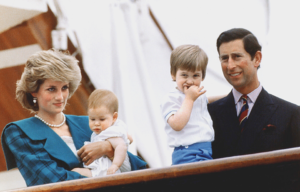 Princess Diana holding baby Prince Harry and Prince Charles holding toddler Prince William