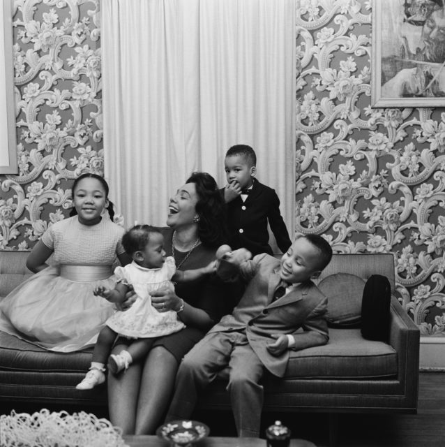 The King family gathered on a couch for a photo