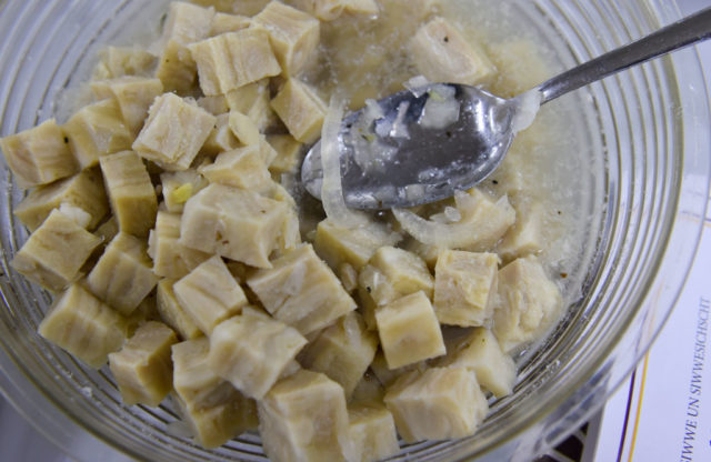 A bowl with small pieces of tripe