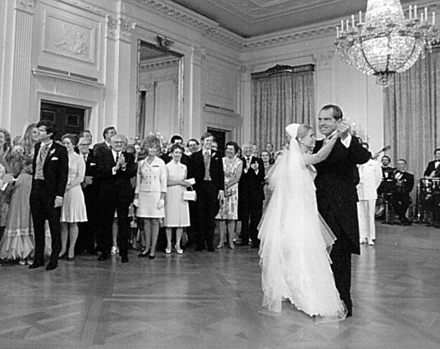 President Nixon with his daughter at her wedding reception