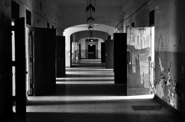 An eerie hallway inside the Trans-Allegheny Lunatic Asylum