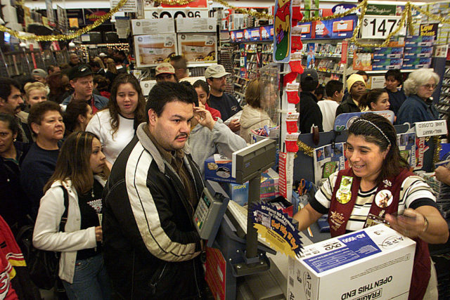 Crowds at a busy Walmart register 