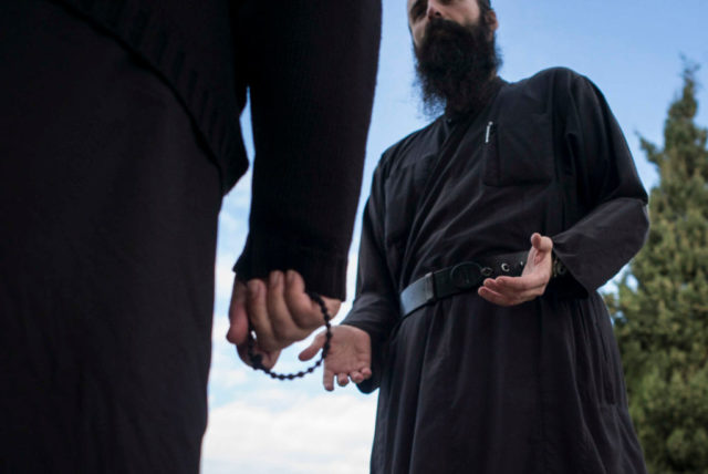 A monk and Abbot talking