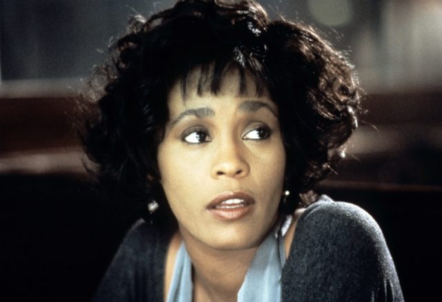 Headshot of Whitney Houston looking to the side
