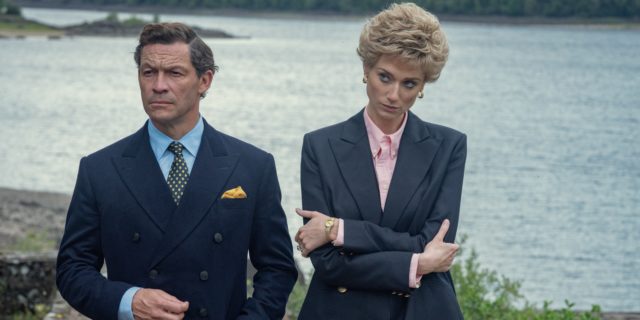 Elizabeth Debicki standing beside Dominic West in a scene from "The Crown."