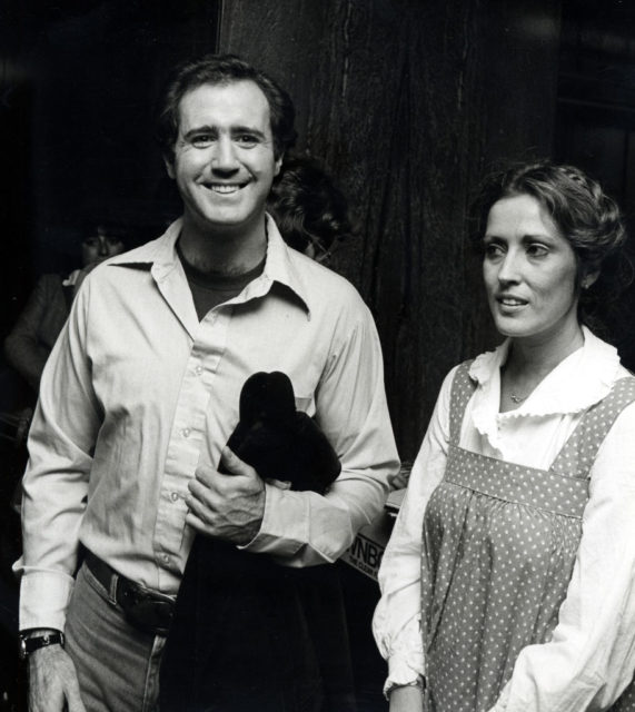 Andy Kaufman and Charmange Leland in a collared shirt and dress respectively. 