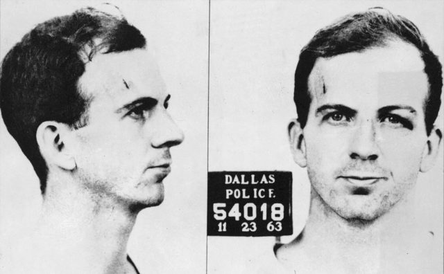 Mugshot of the side and front of Lee Harvey Oswald's face.