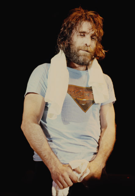 Dennis Wilson with a towel around his neck
