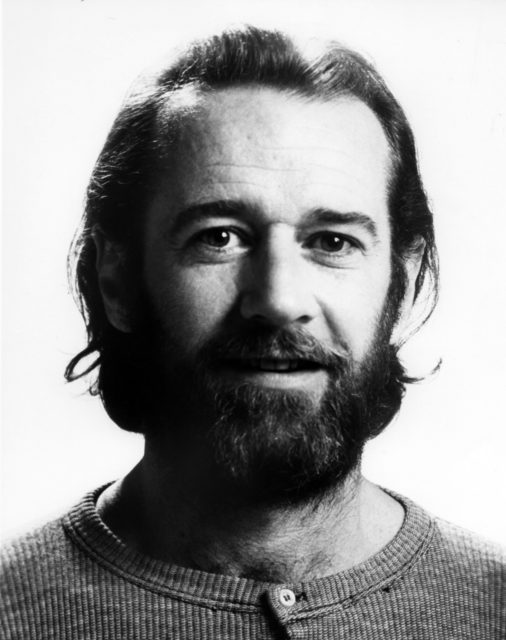 Headshot of George Carlin with a beard
