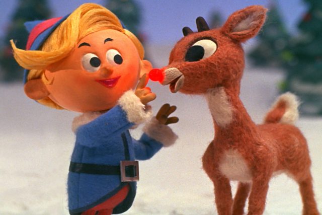 Rudolph the Red-Nosed Reindeer beside Hermey the Elf. 