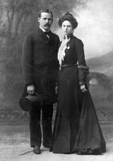 Harry Longabaugh, the Sundance Kid, and Etta Place in a black suit and black dress.