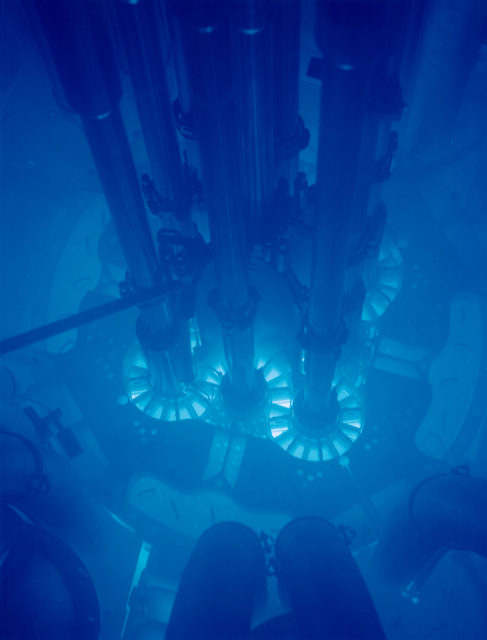 A photo showing Cherenkov radiation, which emits a blue glow
