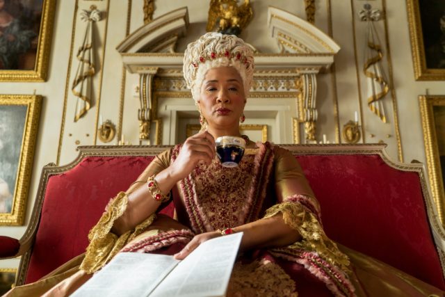 Queen Charlotte with a tea cup in Bridgerton