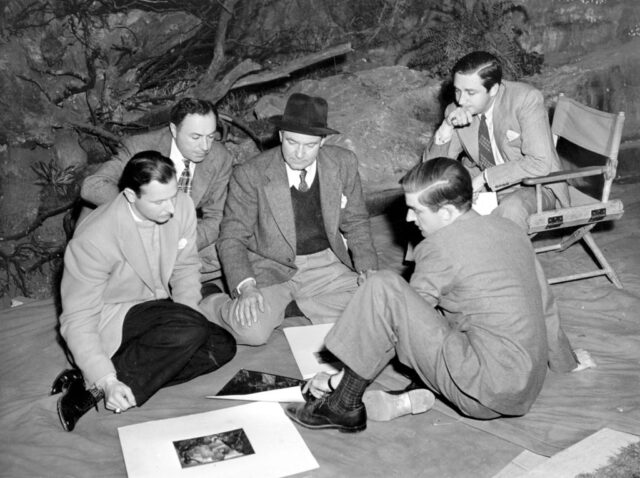 Group of producers and director on the set of The Wizard of Oz
