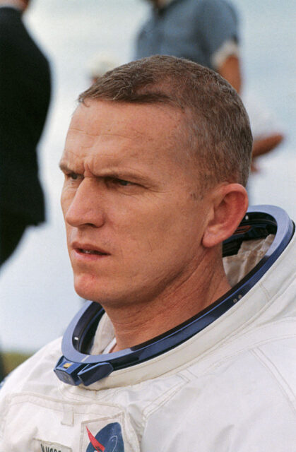 Frank Borman II standing in his astronaut suit