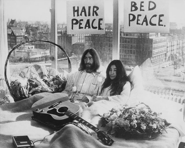 John Lennon and Yoko Ono in bed during a protest