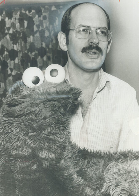 Frank Oz manning the Cookie Monster puppet