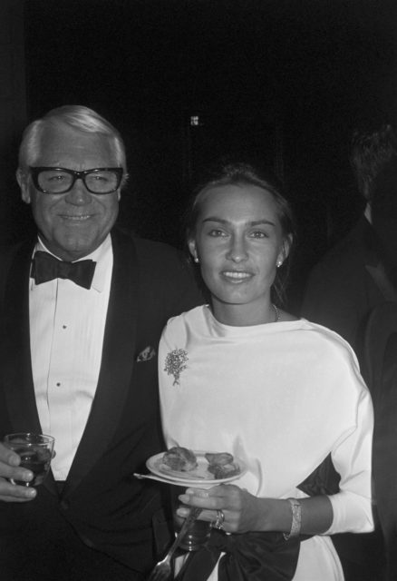 Photo of Cary Grant and daughter Jennifer Grant in formal attire.