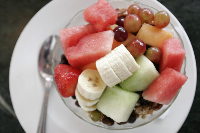 a fruit salad with grapes