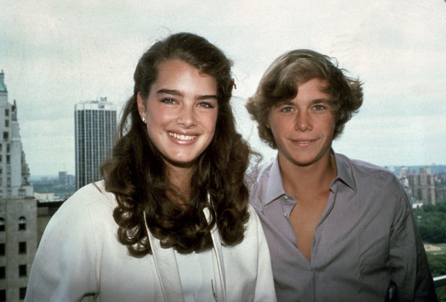 Brooke and co-star Christopher pose on a balcony