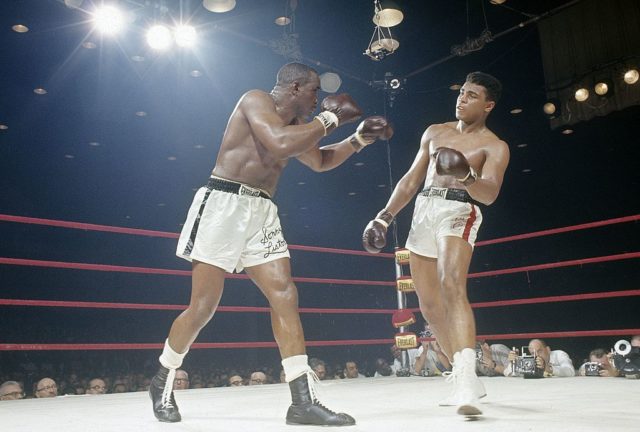 Cassius Clay (R) in action vs Sonny Liston