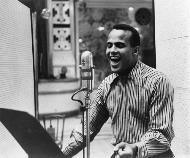Harry Belafonte singing in a recording booth