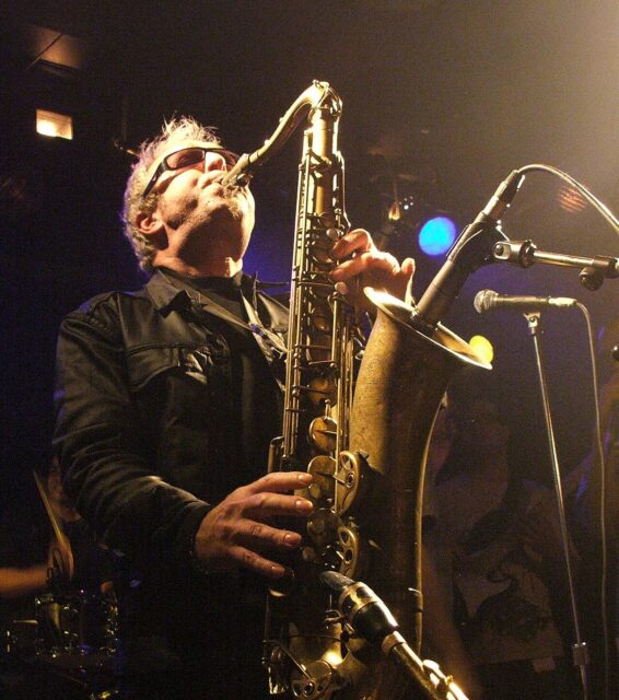 Mars Williams playing the saxophone on stage