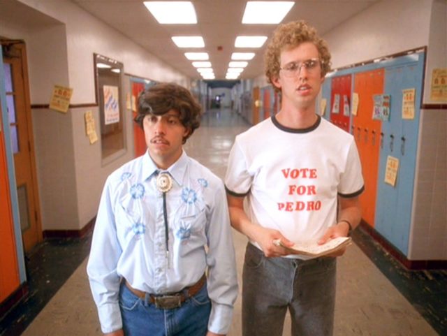 Efren Ramirez as Pedro and Jon Heder as Napoleon Dynamite standing in the school hallway