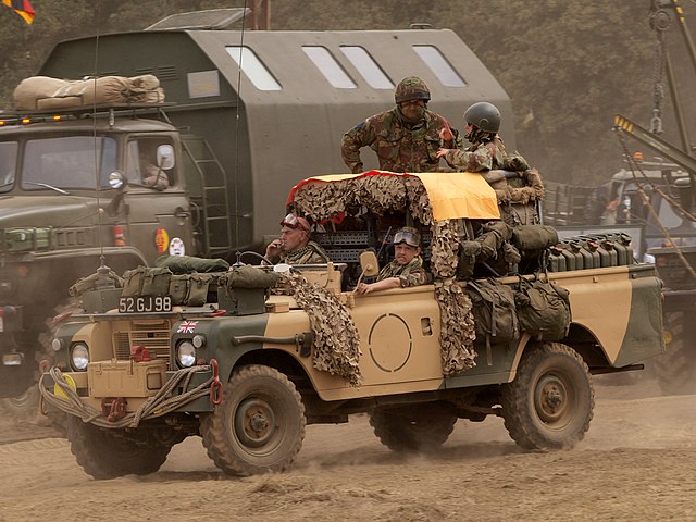 Members of the Special Air Service (SAS) driving a Land Rover