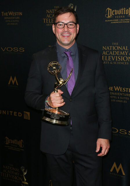 Tyler Christopher holding his Daytime Emmy Award