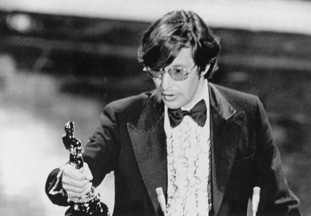 William Friedkin holding up his Oscar