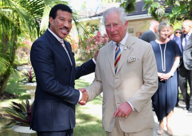 Lionel Richie and Prince Charles shaking hands in Barbados