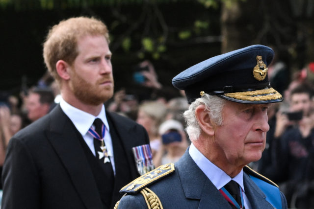 King Charles III and Prince Harry at the Queen's funeral in 2022.