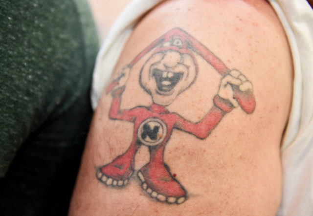 Tattoo of the Noid on someone's arm.