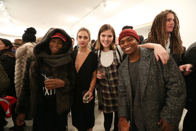 Tessa Gourin and three others posing for a photo together.