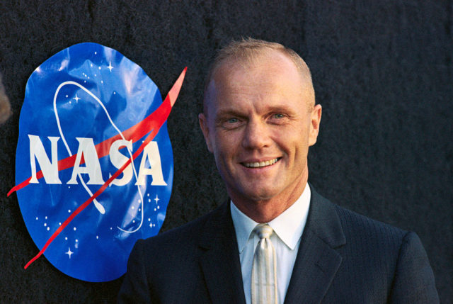 Astronaut John Glenn with NASA Logo 