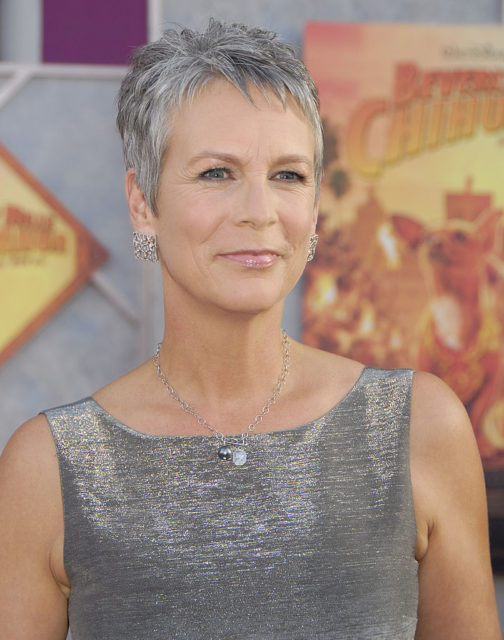 Jamie Lee Curtis at 50 in a grey dress.