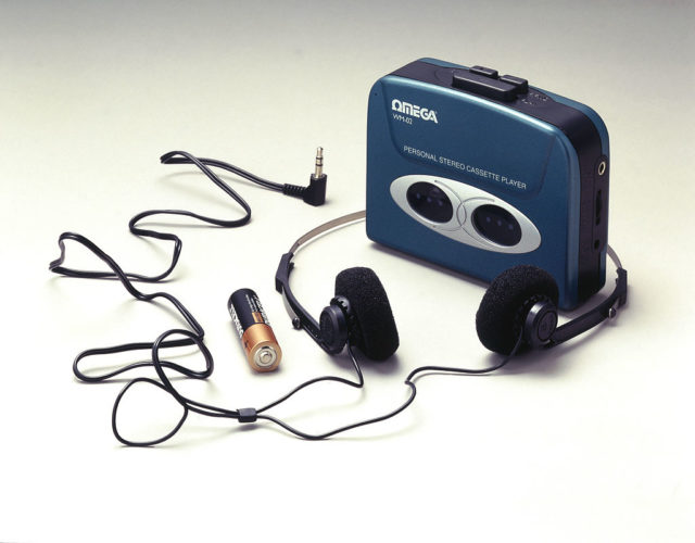 A 1990's walkman portable cassette player. 